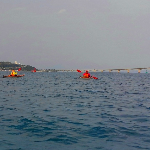 two kayakers paddling near Kouri Island